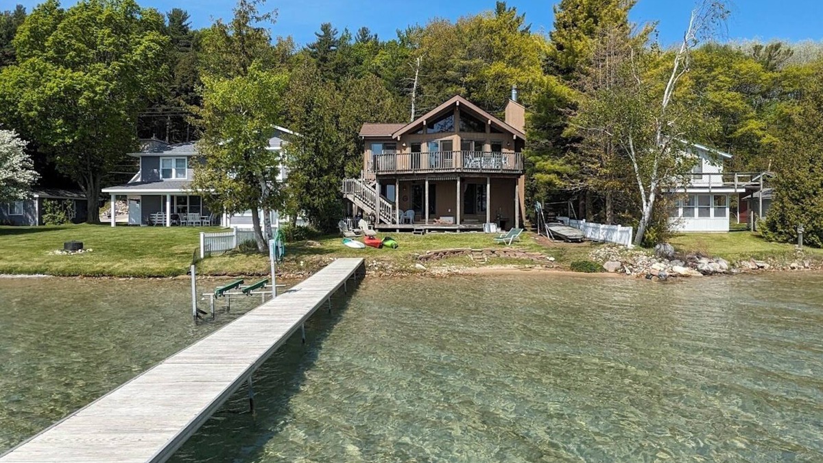 Beulah House | Direct Crystal Lake sandy swimming home. Kayaks, dock, firepit, AC Dog ok