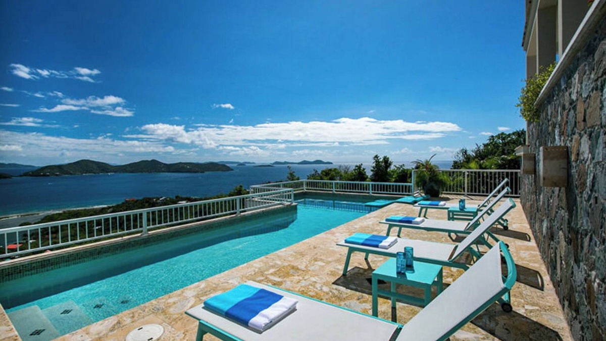 Estate Saint Quaco and Zimmerman Villa | Discover Island Girl—the ultimate stunning villa that offers breathtaking views, a refreshing pool, and luxurious air conditioning! Experience paradise like never before!
