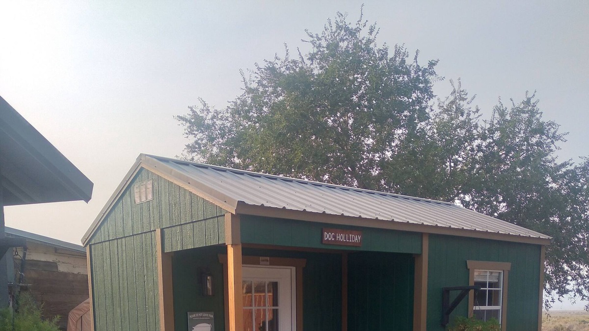 Imlay Cabin | Doc Holliday, has a double bed, sleeps 2 and has a detached private bathroom.