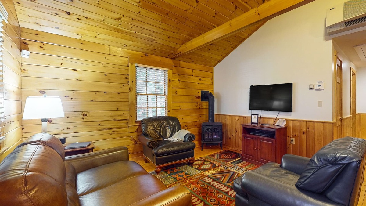 Northport Cabin | Dog-friendly cabin with wooded views, fireplace, AC near outdoor recreation