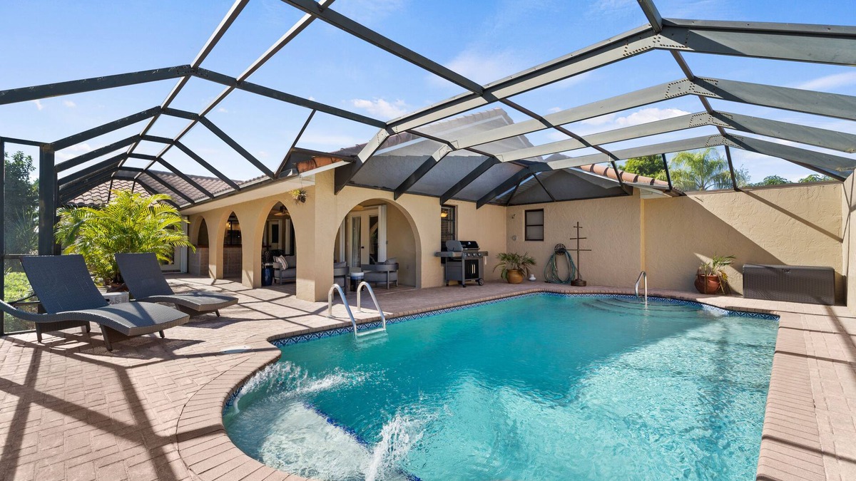 Burnt Store Isles House | Dog-Friendly Canal-Front Home with Heated Pool, Dock, Screened Lanai & Free WiFi