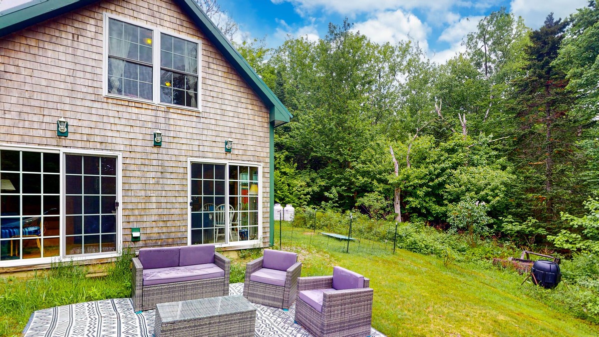 Stockton Springs Cottage | Dog-friendly home in the trees with ocean view & patio - near Fort Point