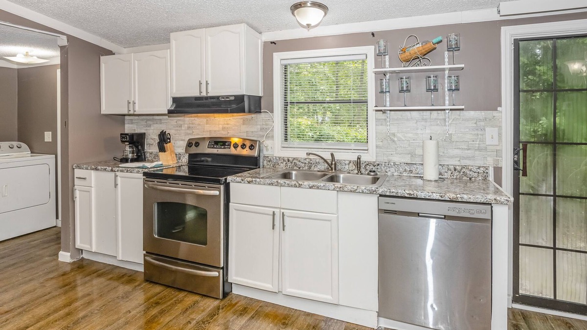 Shallotte House | Dog-friendly home in a prime location with a yard, patio, washer/dryer, and AC