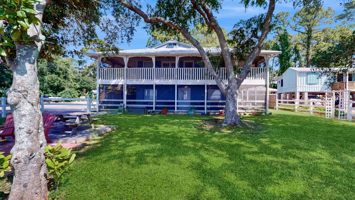 Eastpoint House | Dog friendly home overlooking the Gulf with classic veranda, yard & sunrise view