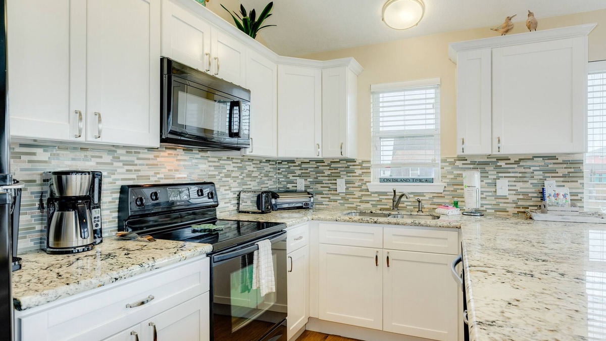 Terramar Beach House | Dog-friendly home with pool access, large deck, lawn games, washer/dryer & AC