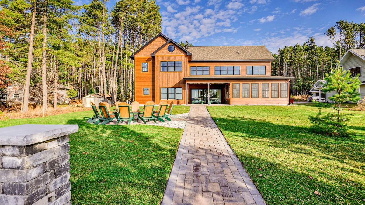 St Germain House | Dog-friendly lakefront home with firepit, 2 grills, fireplace, dock, & kayaks