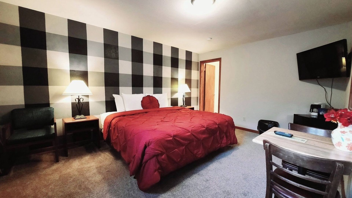Ironwood Apartment | Dog Friendly main level king room inside the Lodge at North Ironwood Acres resort.