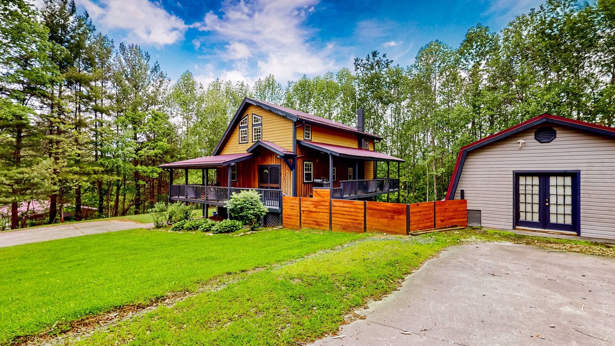 Elk Park House | Dog-friendly remodeled cabin with fireplace, mtn views, grill, deck, W/D, & AC