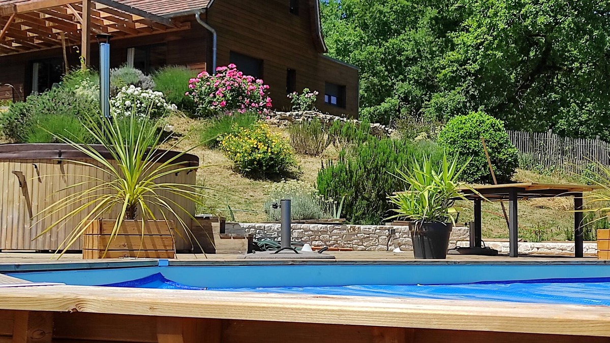 Betaille House | Dordogne Valley Lot timber-frame house set in greenery.
