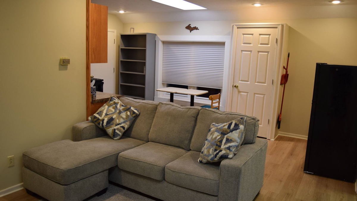 Escanaba Apartment | Downtown Escanaba Gem: Spacious Extended Stay Rental Above Commercial Space!