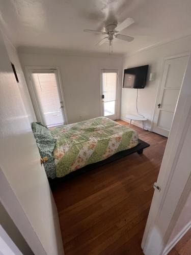 F. Q. Story House | Downtown Neighborhood Room 3