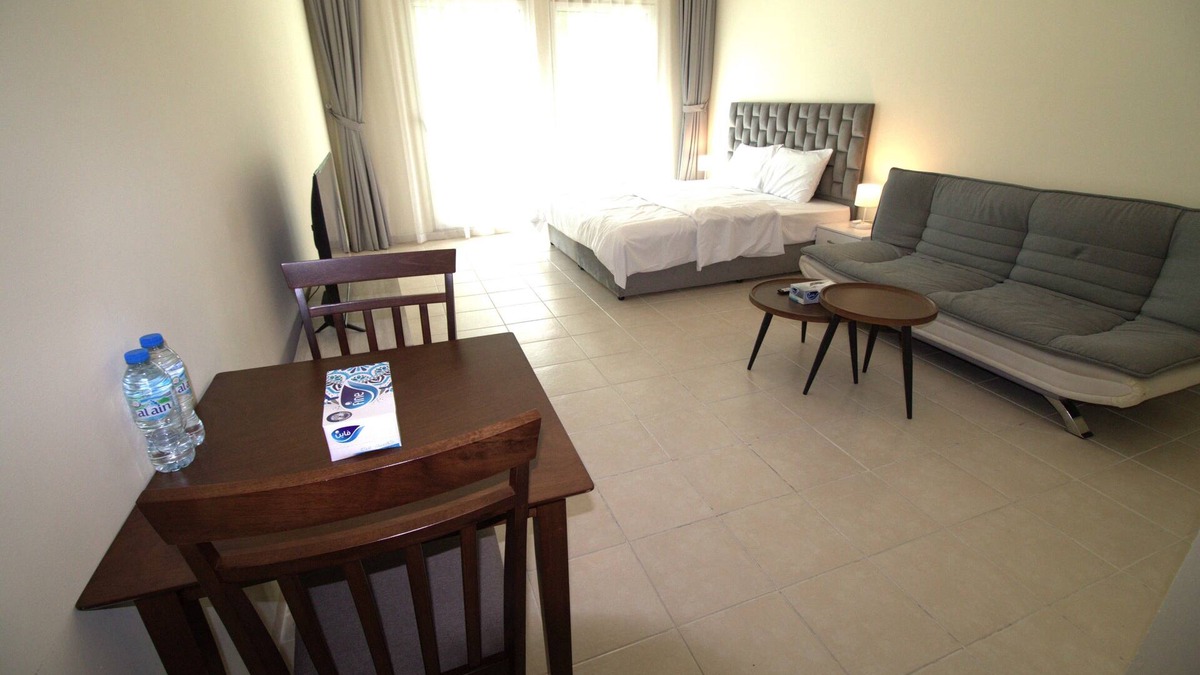 Discovery Gardens Apartment | DRUVYA HOLIDAY HOMES, Bld DG194, Street No,2 Discovery Gardens, Close to Metro