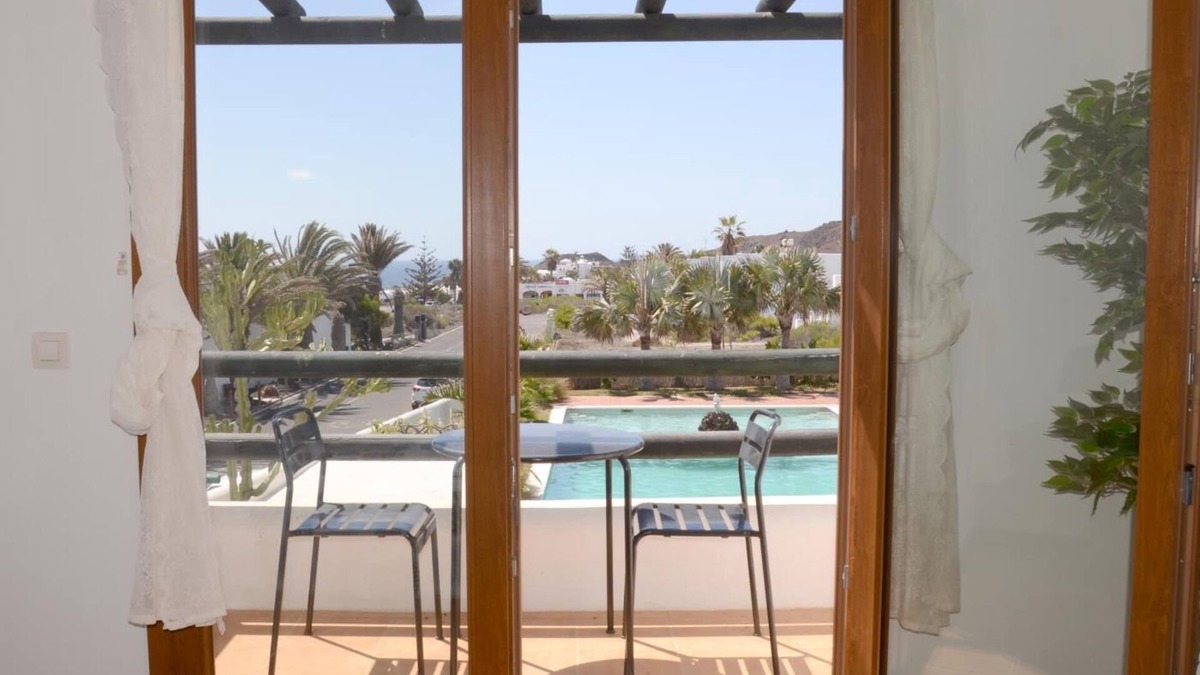 Charco del Palo Cottage | Duplex B16 in a quiet complex with pool 150 m from the sea