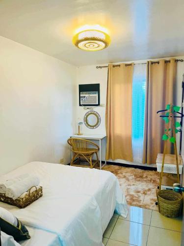 Mandaue Apartment | Eclectic Haven at Urban Deca Homes - 2 bedroom micro unit near SM City , IT Park & Ayala Mall - N0 PARKING