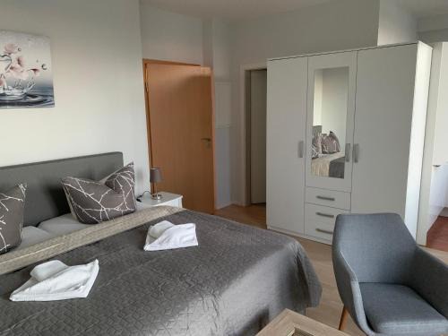 Rheinsberg Apartment | Einraumapartment mit Seeblickbalkon