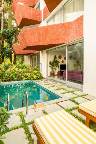 Nerul Apartment | El Volar 2BHK Luxury Apartments 10 Minutes from Candolim Beach with Big common Pool, Fully Equipped Kitchen, 24x7 Security, Wifi