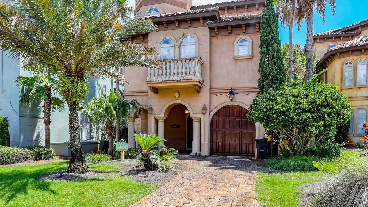 St. Tropez House | Elegant coastal villa with spacious patio, pool, hot tub, free WiFi & central AC