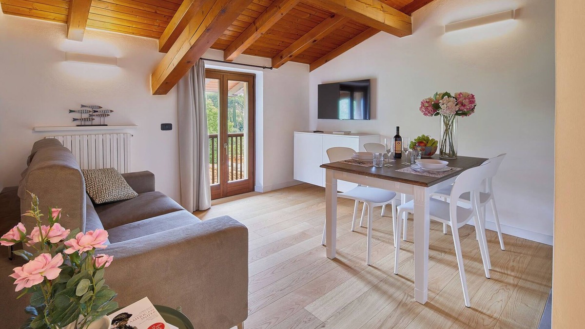 Riva del Garda Apartment | Elegant Top Floor Apartment "Salvia" with Mountain View & Balcony