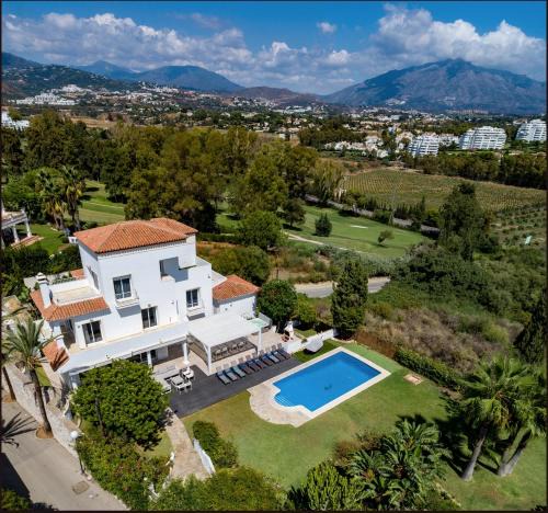 Puerto Banus Villa | Elegant Villa Retreat with Lush Gardens by Lodgerstrip