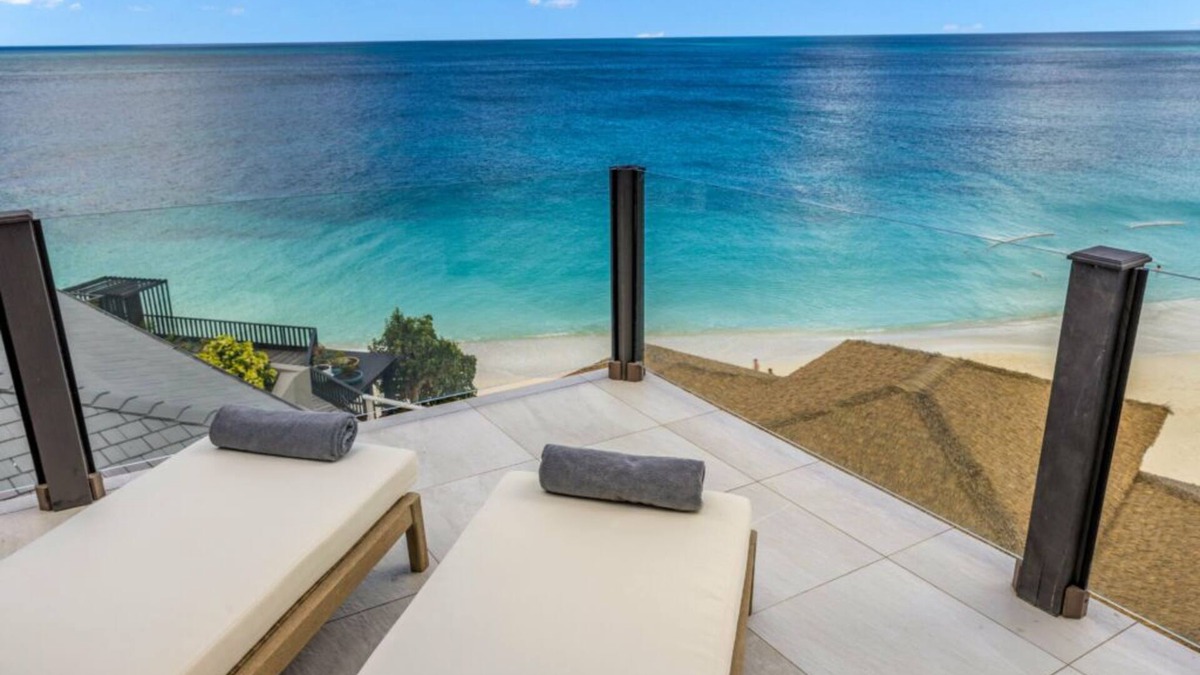 Fryes Beach Hotel | Elevated Beachside Charm with Living Area with Unmatched Caribbean Serenity