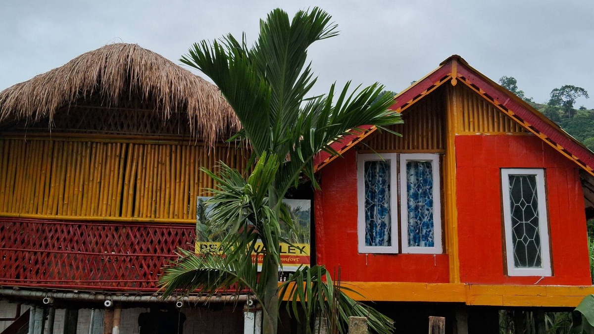 Guwahati House | “Elevated wood cabin and bamboo lounge combo in a lush mountain valley.”