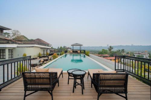 Saipem Apartment | ELIVAAS 1 BHK with Rooftop Pool - Kamerios Skye