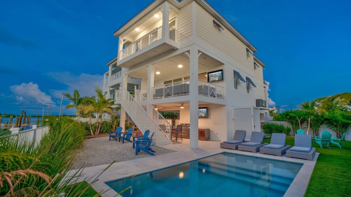 Marathon House | Emerald Shores – Luxury Oceanfront Rental, Heated Pool & Private Dock. Pets Welcome!