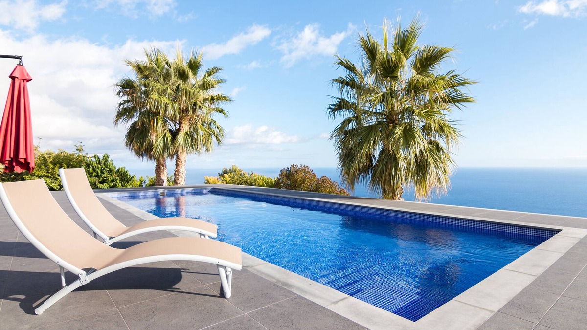 Calheta House | Endless Blue House view of the ocean with a huge pool