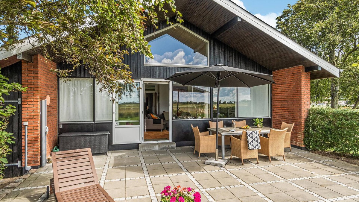Hojer House | Enjoy a great view of the countryside from the terrace of this vacation home.