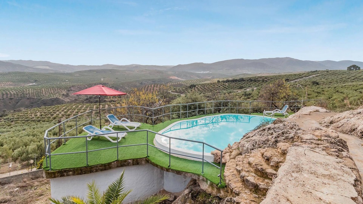 Priego de Cordoba House | Enjoy a unique view of the countryside in this comfortable vacation home with pool.