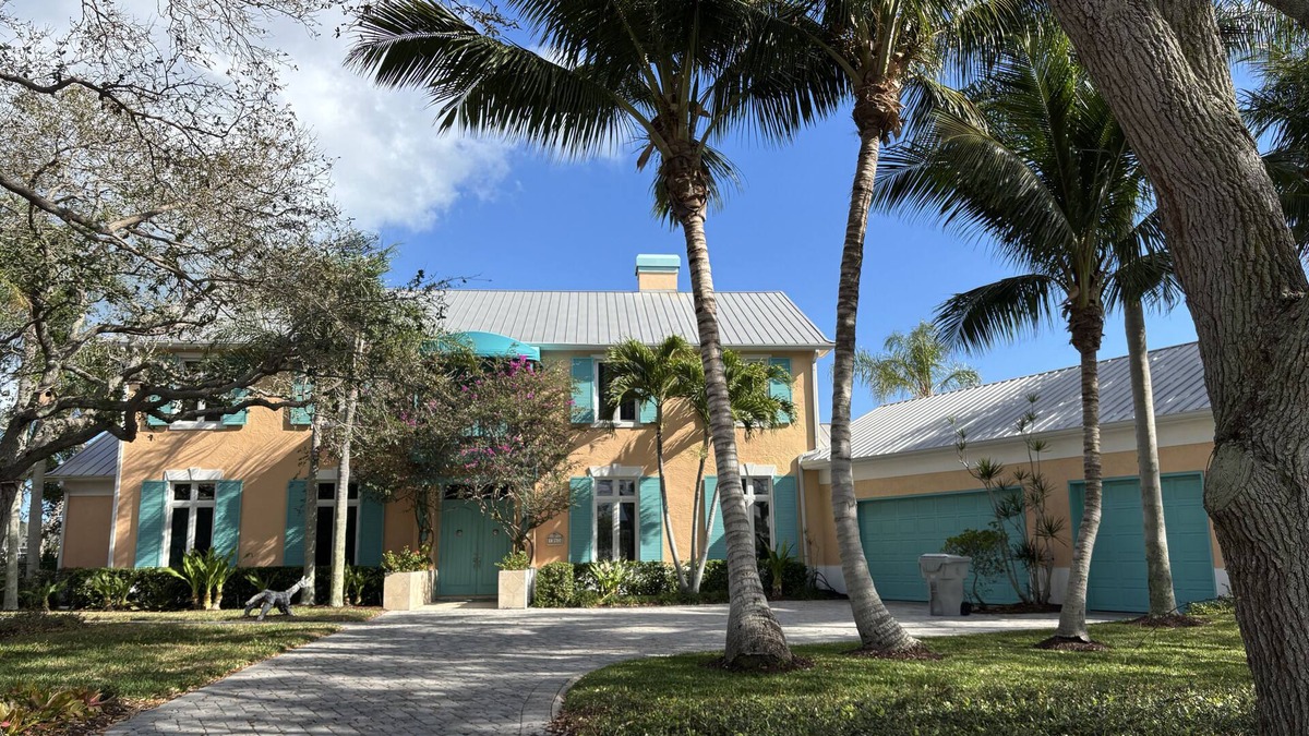 Moorings House | Enjoy our waterfront home with private beach access & boat dock in The Moorings!