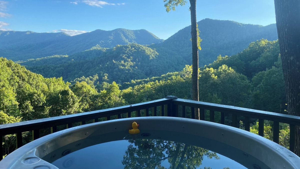 Stecoah House | Enjoy the beautiful view of the mountains in your private hot tub! Pet friendly