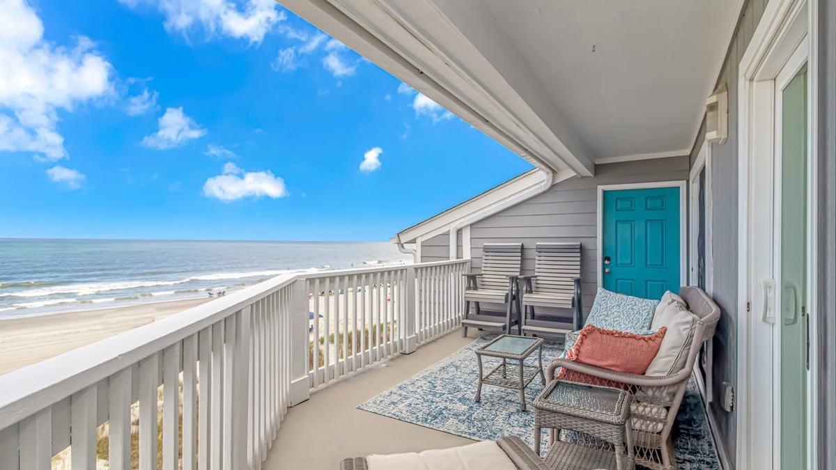 Surfside Beach Condo | Enjoy the warm breeze from your balcony. Baste in the sun. Walk to dinner!n