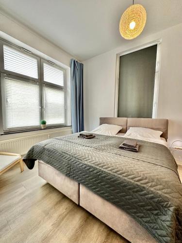 Burgeresch Apartment | Erholsame City-Erdgeschosswohnung mit Veranda, Grill und Parkplatz D46EG