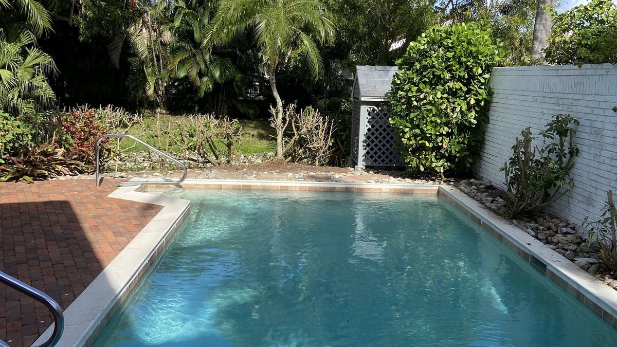 Pelican Bay Villa | Escape to a Private Paradise Walking distance to Beach!