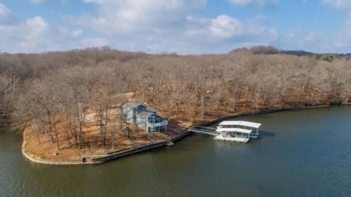 Sunrise Beach House | Estate nestled in woods on Lake of the Ozarks