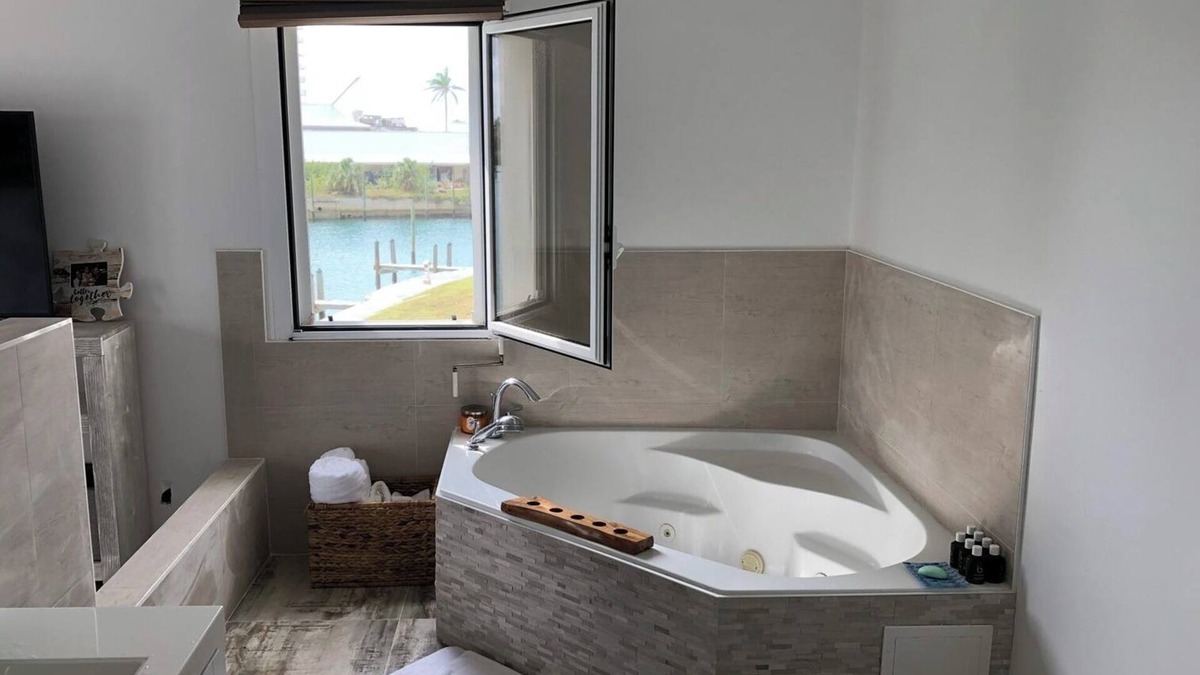 Bahamas Terrace House | European designed townhouse with boat dock access and 5 mins walk from beach.