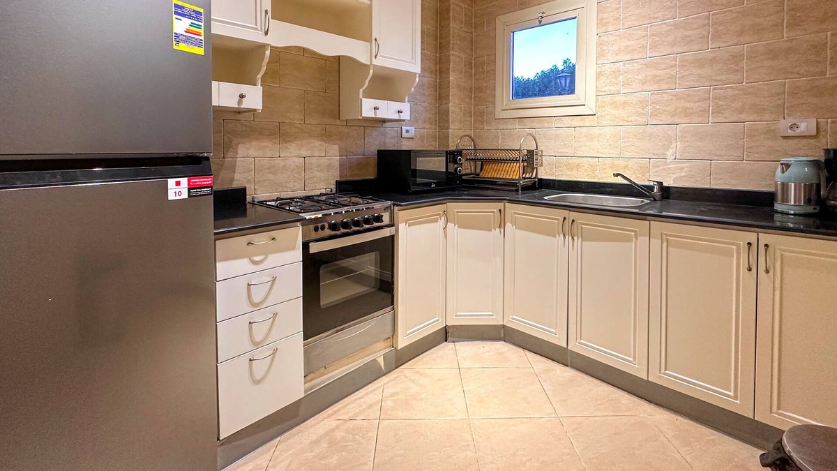 Village Road Apartment | Exclusive apartment with private garden area and big swimming pool