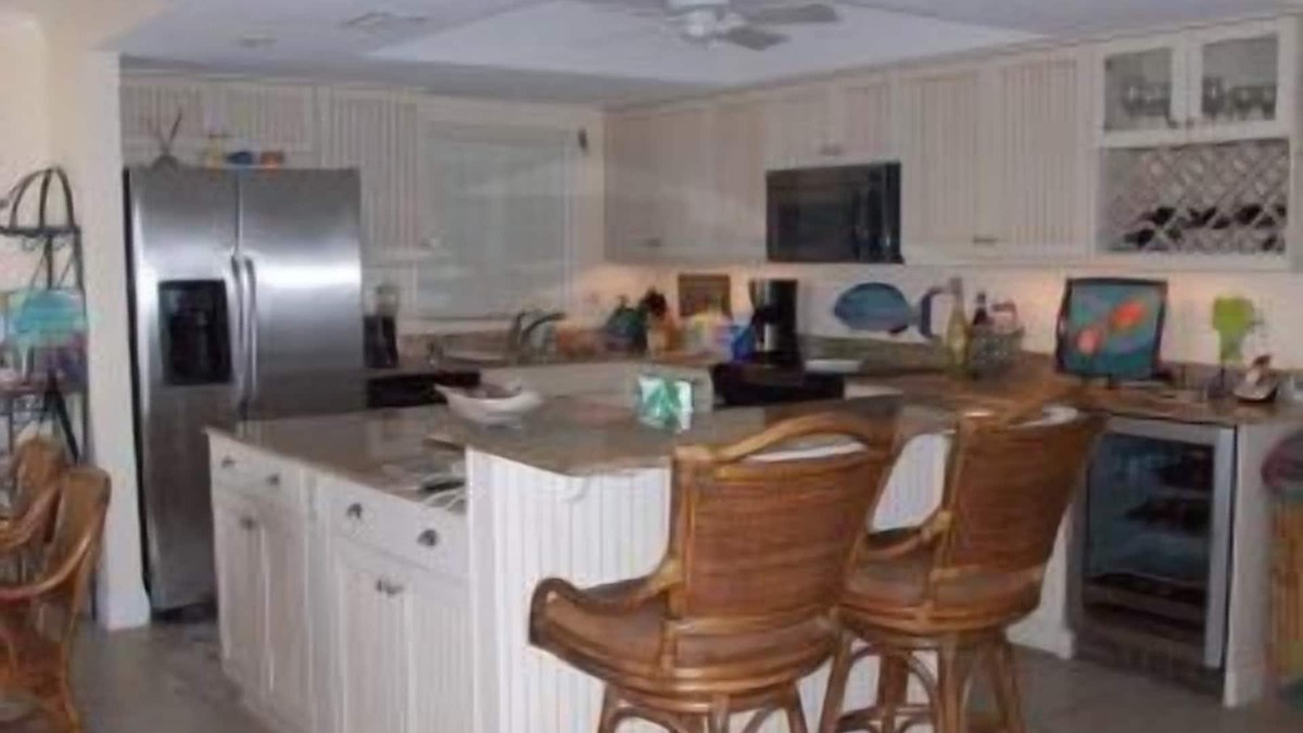 New Smyrna Beach Condo | Exclusive third floor three bedroom three bath end condo!