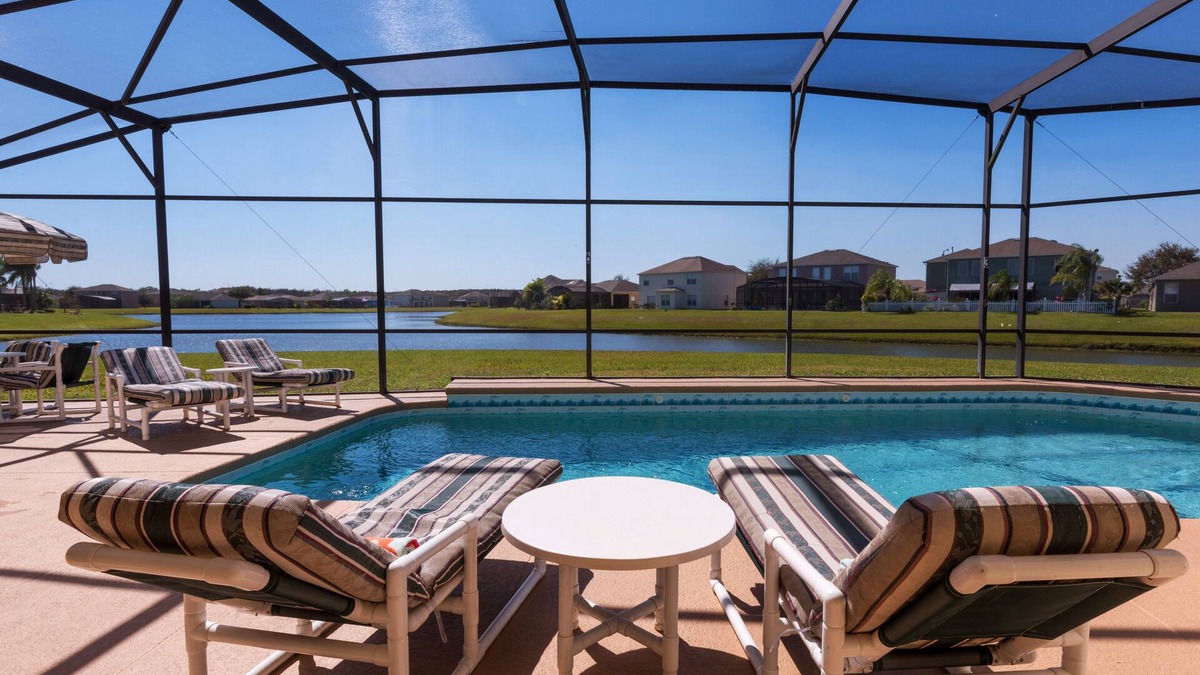 Crescent Lakes Villa | Executive 4 bed 3 bath villa, lake view, large pool with spa 30 mins from Disney