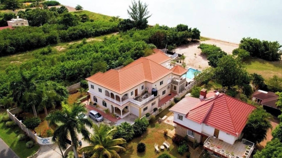 Lacovia Villa | Experience the natural unspoiled beauty of Black River w/ your own beach & pool