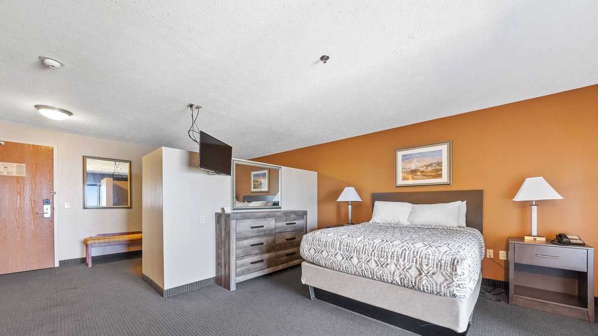 Put-in-Bay House | Experience Luxury and Comfort in Our Spacious Suite with Room Divider 318