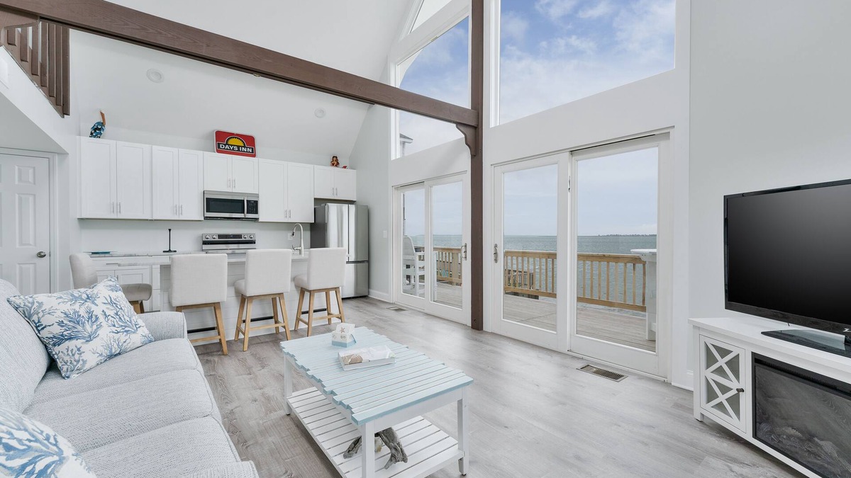 Colington Harbour House | Experience the serene beauty of the Soundfront at Shenanigan's, a charming home in Kill Devil Hills