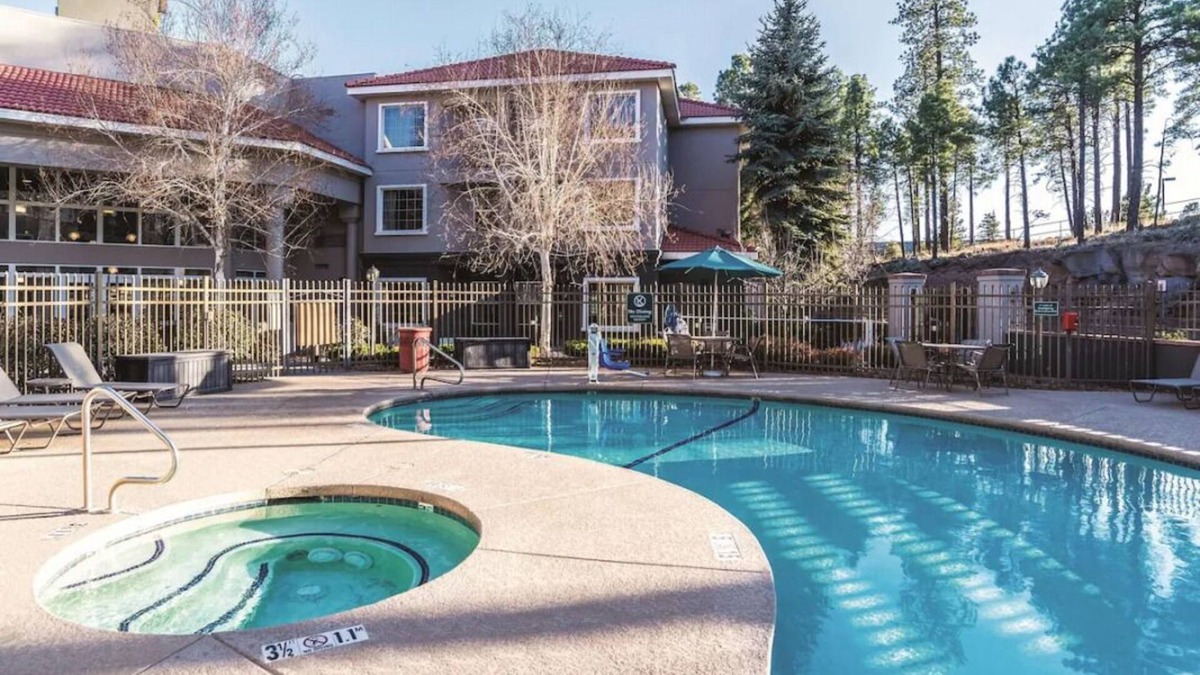 Woodlands Village House | Explore Flagstaff! Free Breakfast, Onsite Pool, Free Parking, Pets Allowed