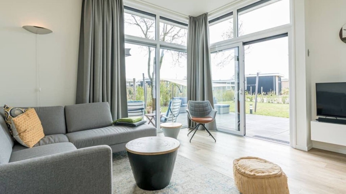 Burgh-Haamstede House | Extensive garden with spacious terraces and even space for a relaxing hammock. With the shade cloth