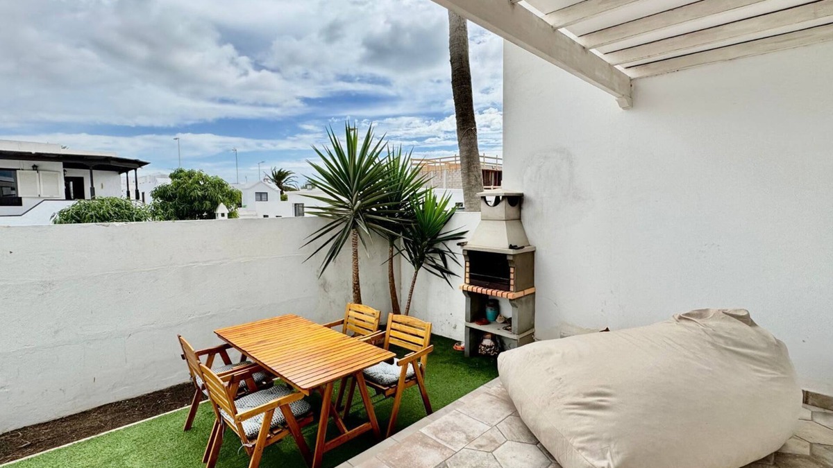 Playa Honda Apartment | Family Palms Retreat: Terrace, BBQ & Beach Bliss! By Bayside Rentals