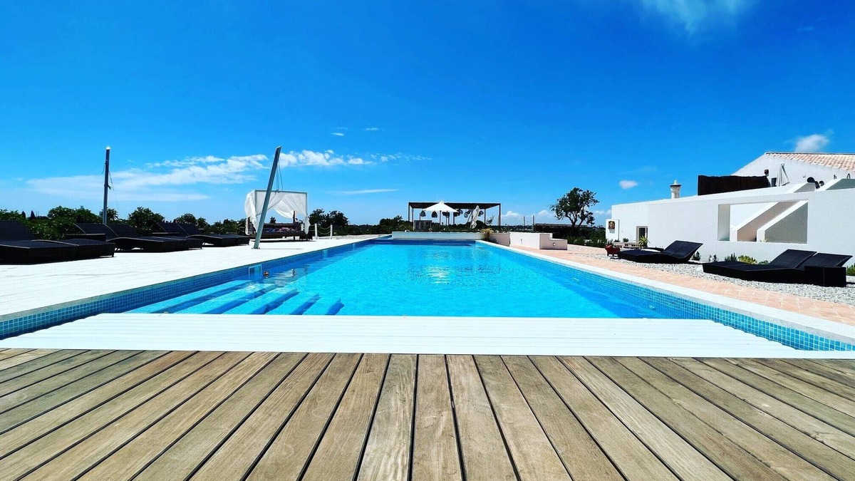 Poco Partido Bed & Breakfast | Family room with private patio + breakfast