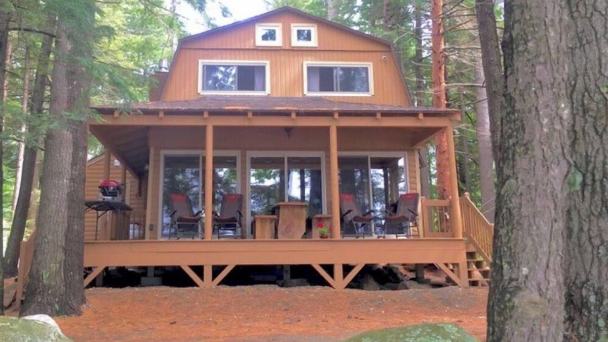 Belgrade House | Famous cottage directly on 100' private shoreline of pristine lake.