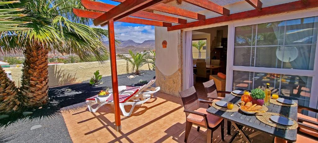 La Pared House | Ferienhaus Casa Oasis - La Pared - Garten - Meerblick