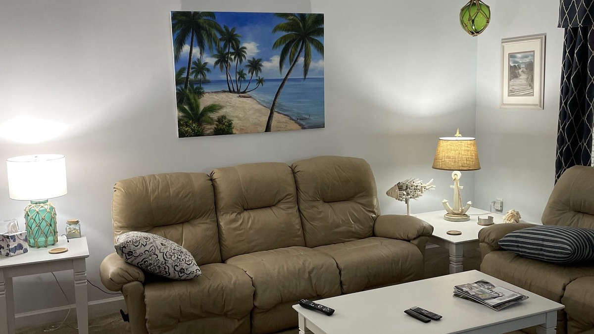 Calabash Condo | First floor corner unit overlooking 11th fairway on premier golf course.